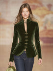 Dark green velvet blazer for women with gold buttons, stylish FJØRNA jacket shown on a model.