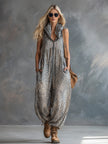 FJØRNA apricot leopard print hooded chiffon jumpsuit with long sleeves and a relaxed fit, stylish and lightweight for warm weather.