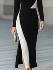 FJØRNA modern black and white asymmetric color-block midi dress, stylish women's dress with bold geometric design.