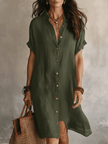 FJØRNA black linen midi dress with a relaxed boho style, featuring a flowing silhouette and casual chic design.