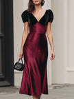 FJØRNA Burgundy satin midi dress with black velvet puffy sleeves, elegant and stylish for special occasions.