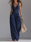 FJØRNA white sleeveless wide-leg jumpsuit with patch pockets, lightweight and stylish for casual or summer wear.
