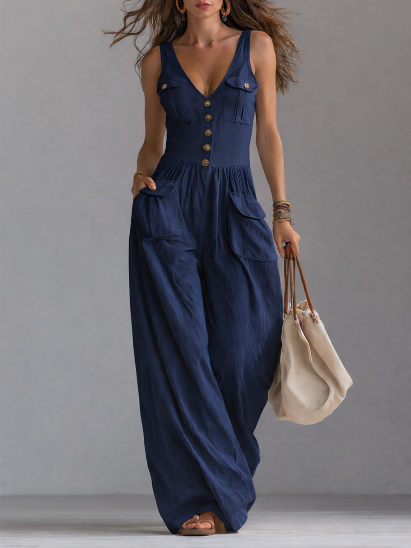 FJØRNA white sleeveless wide-leg jumpsuit with patch pockets, lightweight and stylish for casual or summer wear.