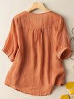 FJØRNA women's summer blouse featuring a V-neck, linen fabric, and flowy casual fit, ideal for warm weather.