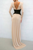 Color-blocked V-neck long-sleeve maxi dress by FJØRNA featuring a high slit and slim fit, perfect for elegant occasions.