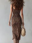 FJØRNA leopard print midi dress for women, featuring a stylish animal pattern and flowing silhouette for a fashionable look.