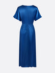 FJØRNA draped maxi dress with ruched V-neck and raglan sleeves, flowing silhouette, and elegant fabric for a stylish look.