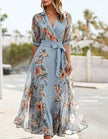 Blue midi dress for women with lapel collar and printed pattern, by FJØRNA, shown on a model.