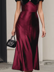 FJØRNA burgundy satin midi dress with black velvet puffy sleeves, elegant evening dress with a fitted silhouette.