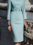 FJØRNA powder blue draped collar pencil midi dress, stylish and elegant, shown on a model highlighting its fitted silhouette and midi length.