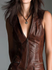 Brown eco leather zip-front mini dress for women by FJØRNA, featuring a fitted silhouette and stylish design.