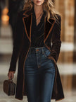 Brown velvet colour-block lapel coat by FJØRNA with pockets, stylish and cozy, shown on a model.
