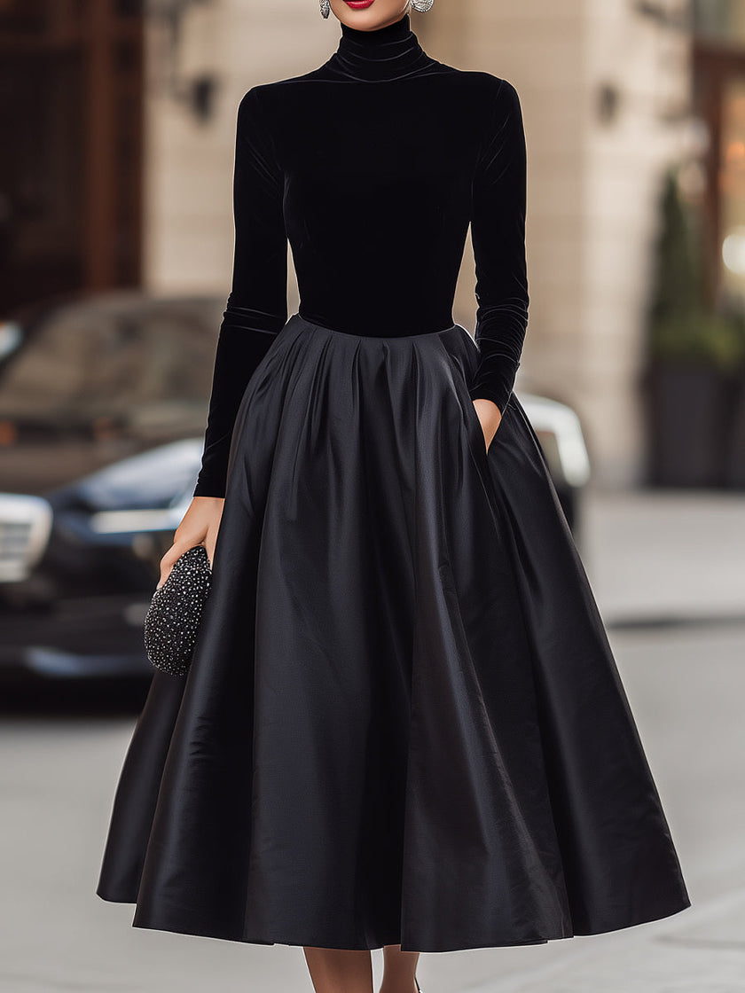 Elegant black velvet and satin midi dress for women by FJØRNA, showcasing a stylish midi dress with luxurious fabric details.
