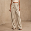 FJØRNA women's high waist wide leg trousers with pleats, stylish and comfortable pants for a modern look.