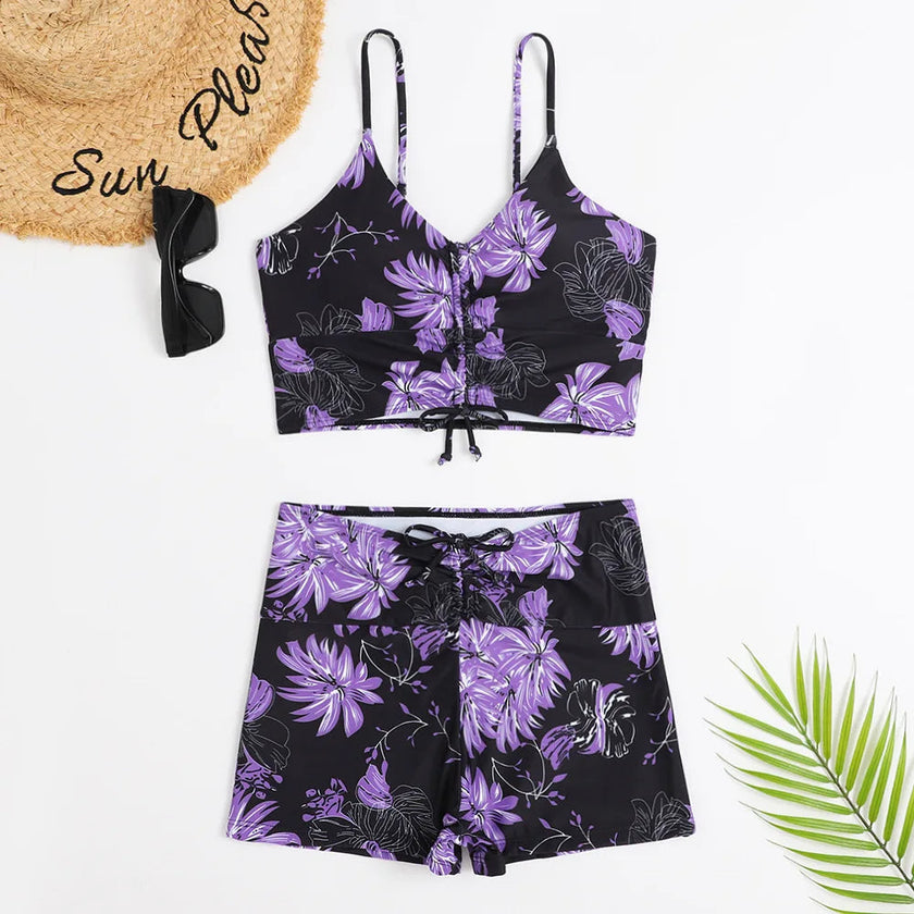 Women's printed FJØRNA tankini set with flattering fit, featuring colorful pattern and supportive design for swimwear.