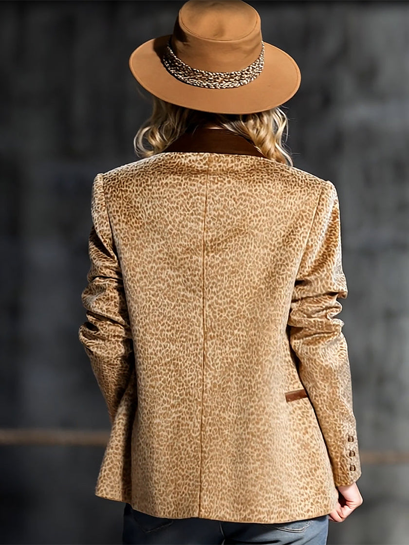 FJØRNA khaki leopard print colour-block velvet blazer with tailored fit and lapel collar, styled on a hanger.