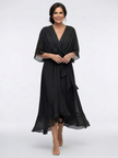 Flowy FJØRNA summer midi dress for women with wrap design and sleeveless style, perfect for warm-weather occasions.