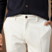 FJØRNA men's slim fit trousers, stylish pants with a tailored design, shown in a modern, slim silhouette.