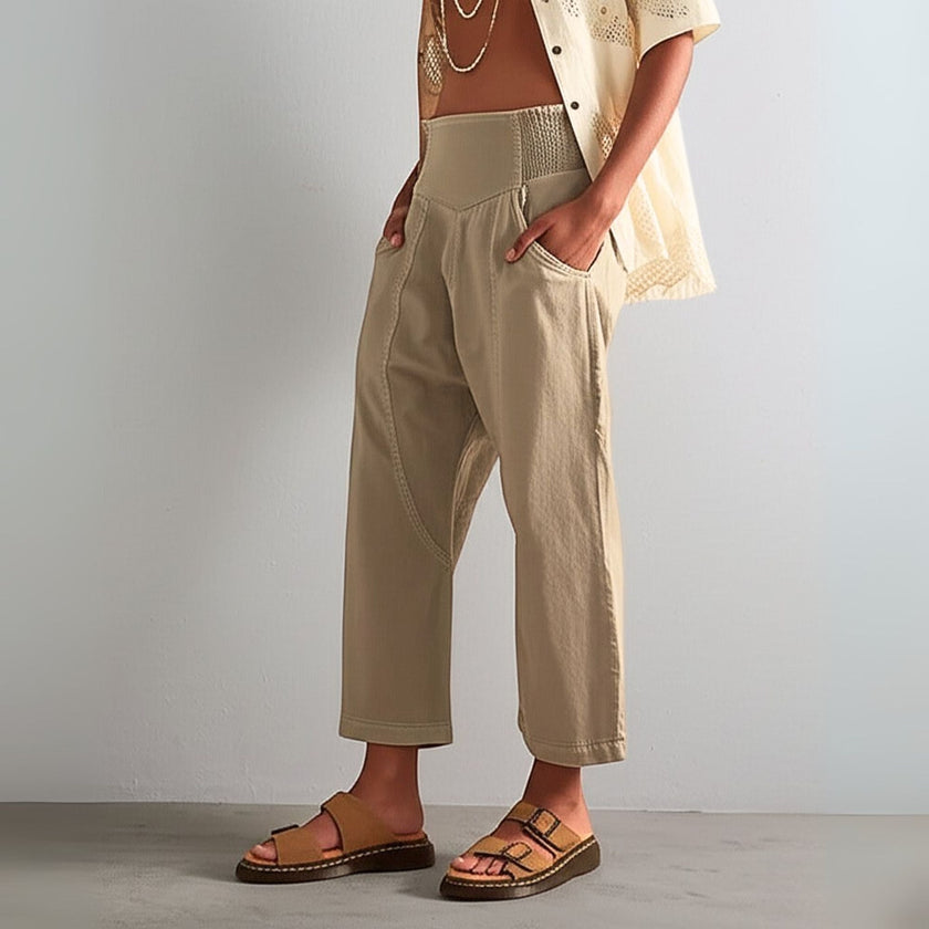 FJØRNA women's wide-leg denim jeans, stylish and comfortable pants with a relaxed fit, shown on a model.