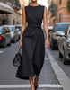 FJØRNA women's midi dress with round neck, pleated design, sleeveless style, perfect for casual or formal occasions.
