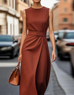 FJØRNA women's midi dress with round neck, pleated design, sleeveless style, perfect for casual or elegant occasions.