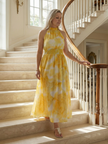 FJØRNA women's summer midi dress featuring a halter neck and sleeveless casual design, perfect for warm weather.