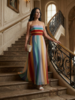FJØRNA women's summer maxi dress with blue and white stripes, strapless, pleated design, flowing and lightweight for warm weather.