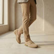 FJØRNA men's suede slip-on loafers with breathable design and sleek style, shown in a close-up view of the shoes.