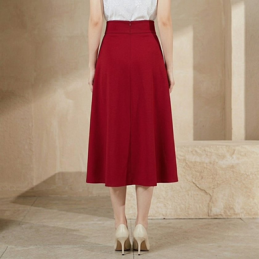 FJØRNA high waist midi skirt for women with side pockets, stylish and versatile women's pants in a neutral color.
