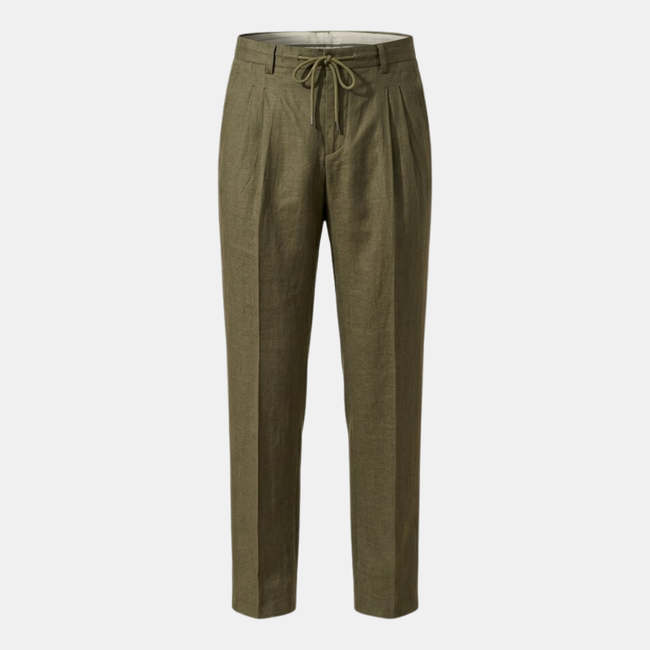 Men's linen trousers by FJØRNA with drawstring waist and pleated design, showcasing relaxed, lightweight pant style.