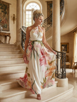 FJØRNA women's summer maxi dress with floral pattern, halter neck, sleeveless, relaxed fit, perfect for warm weather.