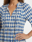 FJØRNA women's summer midi dress with a colorful print, wrap style, flowing fabric, perfect for warm weather and casual outings.