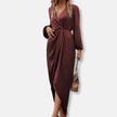 FJØRNA elegant midi dress for women with V-neck and long sleeves, showcasing a stylish and sophisticated evening wear look.