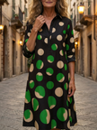FJØRNA women's summer dress with polka dots, featuring pockets and a flowy, casual design perfect for warm weather.