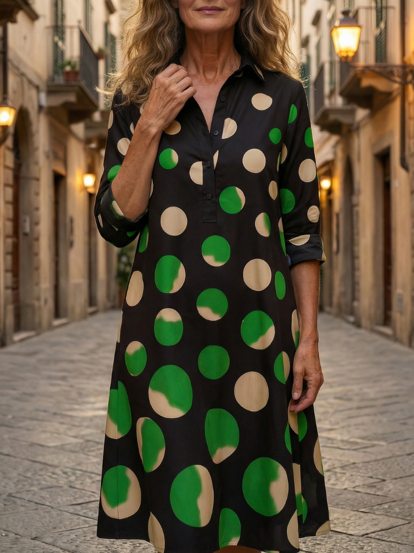 FJØRNA women's summer dress with polka dots, featuring pockets and a flowy, casual design perfect for warm weather.