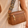 FJØRNA leather shoulder bag for women with sleek design, featuring adjustable strap and spacious interior for everyday use.