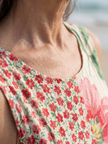 FJØRNA women's floral summer midi dress with short sleeves, flowy fabric and a relaxed fit, perfect for warm weather.