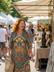 FJØRNA women's summer midi dress with long sleeves, wrap style, flowy lightweight fabric, ideal for warm weather.