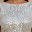 Sparkle glitter mini dress for women by FJØRNA featuring a fitted silhouette and shimmering fabric for stylish occasions.