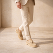 FJØRNA men's suede shoes showcasing stylish brown leather footwear with laces and a sleek design.