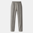 Men's wide leg joggers by FJØRNA featuring drawstrings, casual pants with relaxed fit and comfortable fabric.