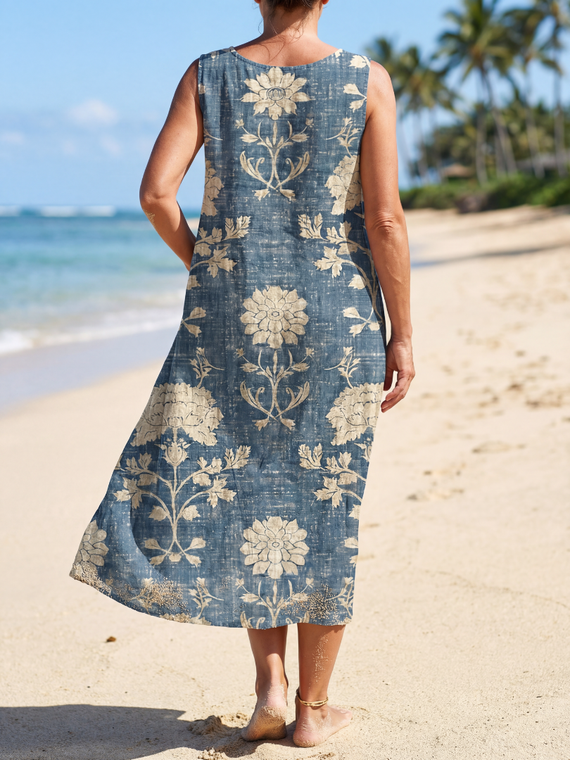 FJØRNA women's floral sleeveless wrap midi dress for summer, showcasing a feminine design and vibrant floral pattern.
