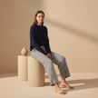 Women’s striped drawstring trousers by FJØRNA featuring relaxed fit and stylish pattern, perfect for casual wear.