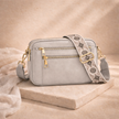 FJØRNA leather shoulder bag for women with adjustable strap and sleek design, ideal for casual or formal wear.