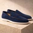 FJØRNA men's suede slip-on loafers featuring a sleek design, rounded toe, and comfortable fit, perfect for casual or formal wear.