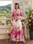 FJØRNA women's floral summer maxi dress with belt, flowing fabric, and vibrant floral pattern, perfect for warm weather.