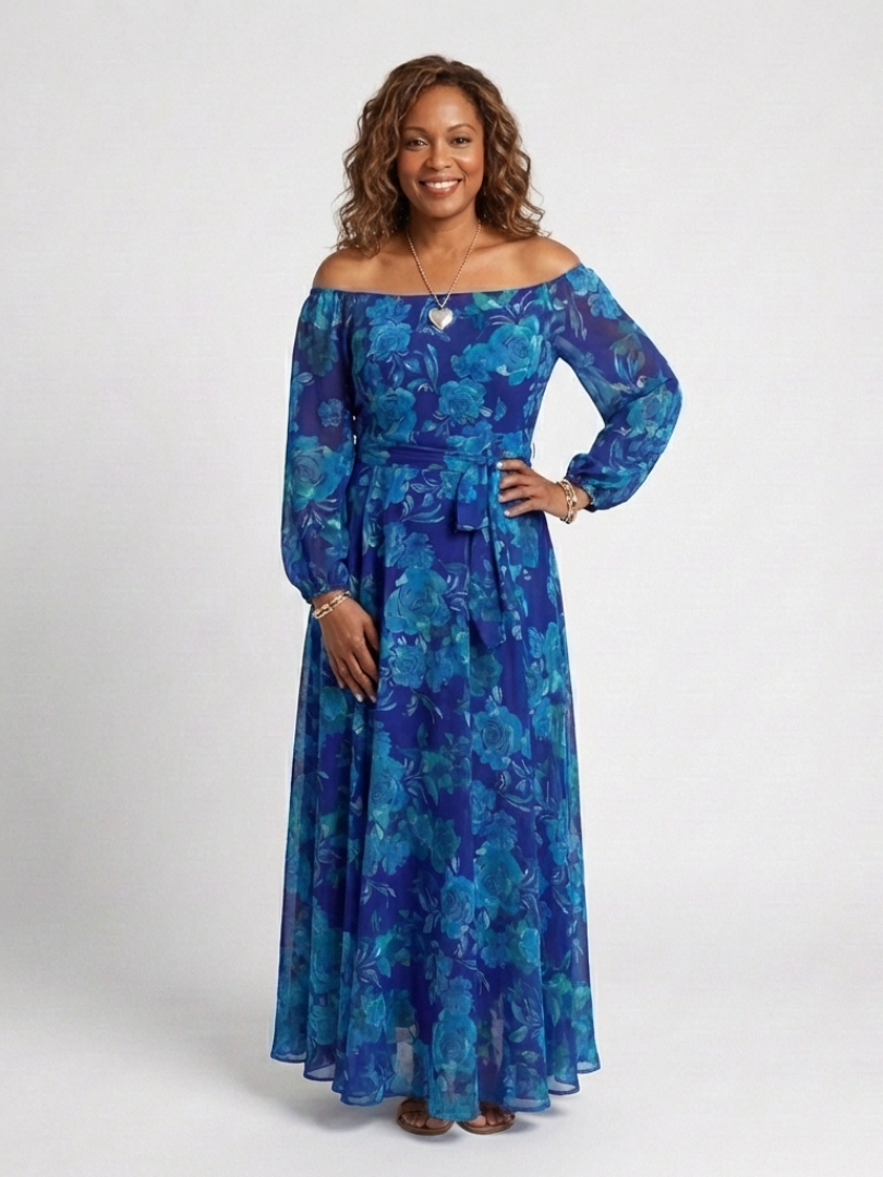 FJØRNA women's floral summer maxi dress with flowy fabric, sleeveless design, and vibrant floral pattern perfect for warm weather.