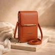FJØRNA women's anti-theft travel crossbody bag with secure zipper closure and adjustable strap, designed for convenient travel security.