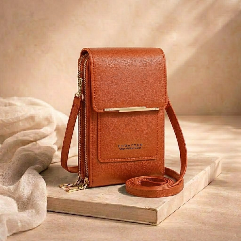 FJØRNA women's anti-theft travel crossbody bag with secure zipper closure and adjustable strap, designed for convenient travel security.