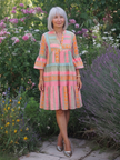 FJØRNA women's summer dress with geometric tiered design, sleeveless style, lightweight fabric, perfect for warm weather.